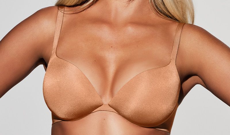 SKIMS, The total package. Your old push-up bra was designed to do one  thing: push up your boobs. SKIMS Ultimate Bra does it all: fully  reshapes